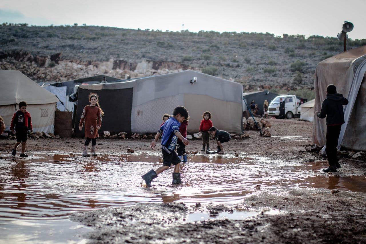 Kid playing in mud